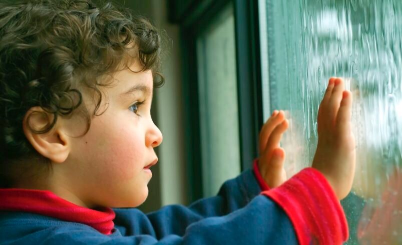 Toddler Entertained on a Rainy Day